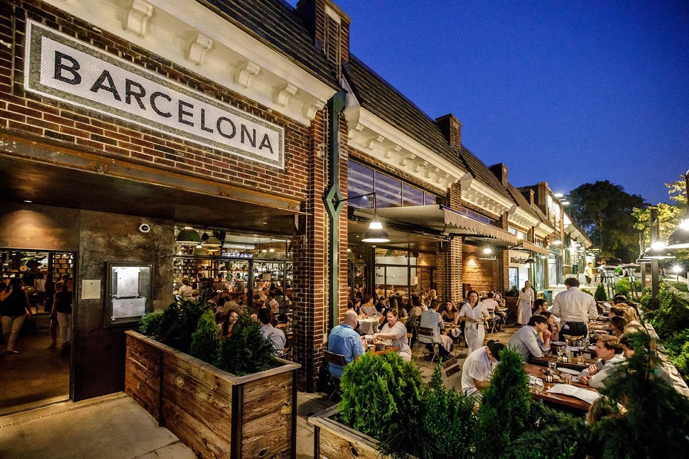 Barcelona's vibrant exterior on a busy night