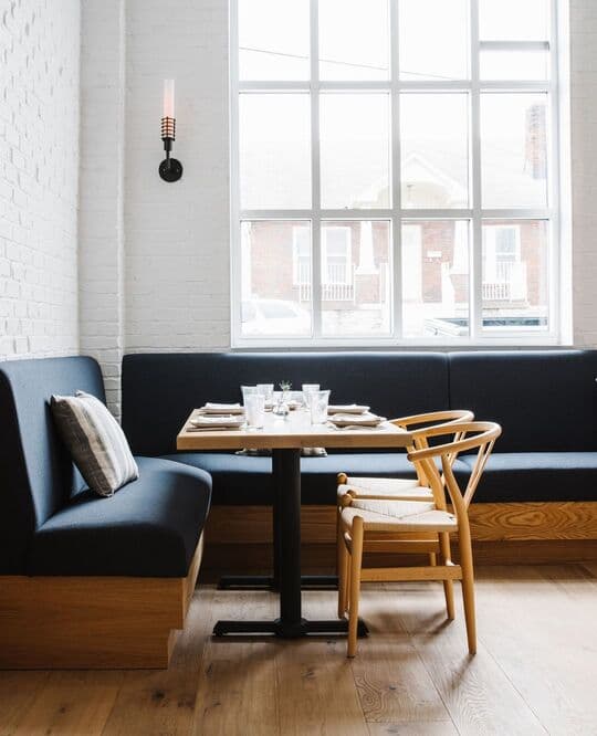 A table in the corner of a restaurant