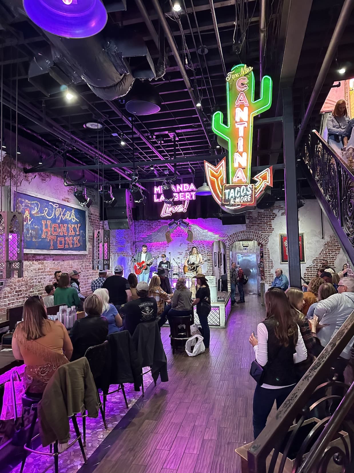 Casa Rosa first floor band and people