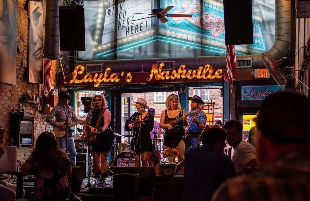 A band playing on Layla's Stage