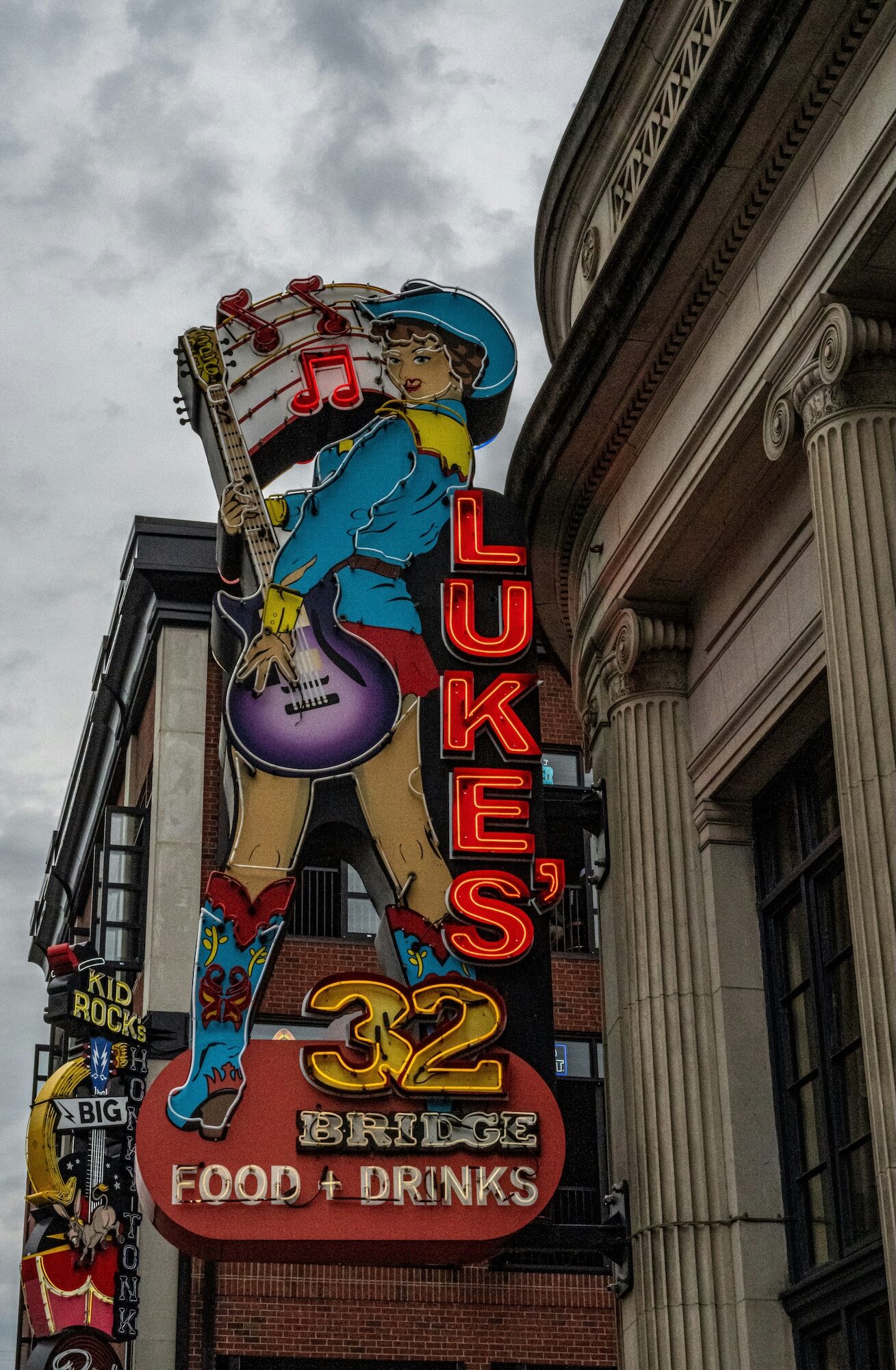 Luke Bryan's bars neon road sign