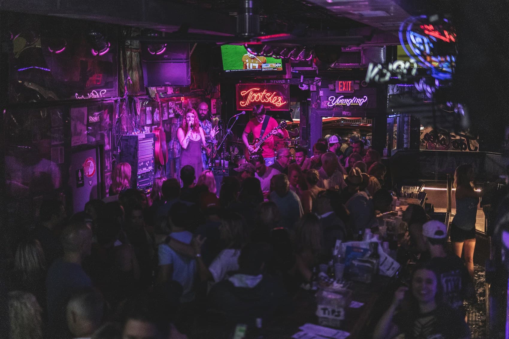 A large crowd packed inside Tootsies Orchid Lounge
