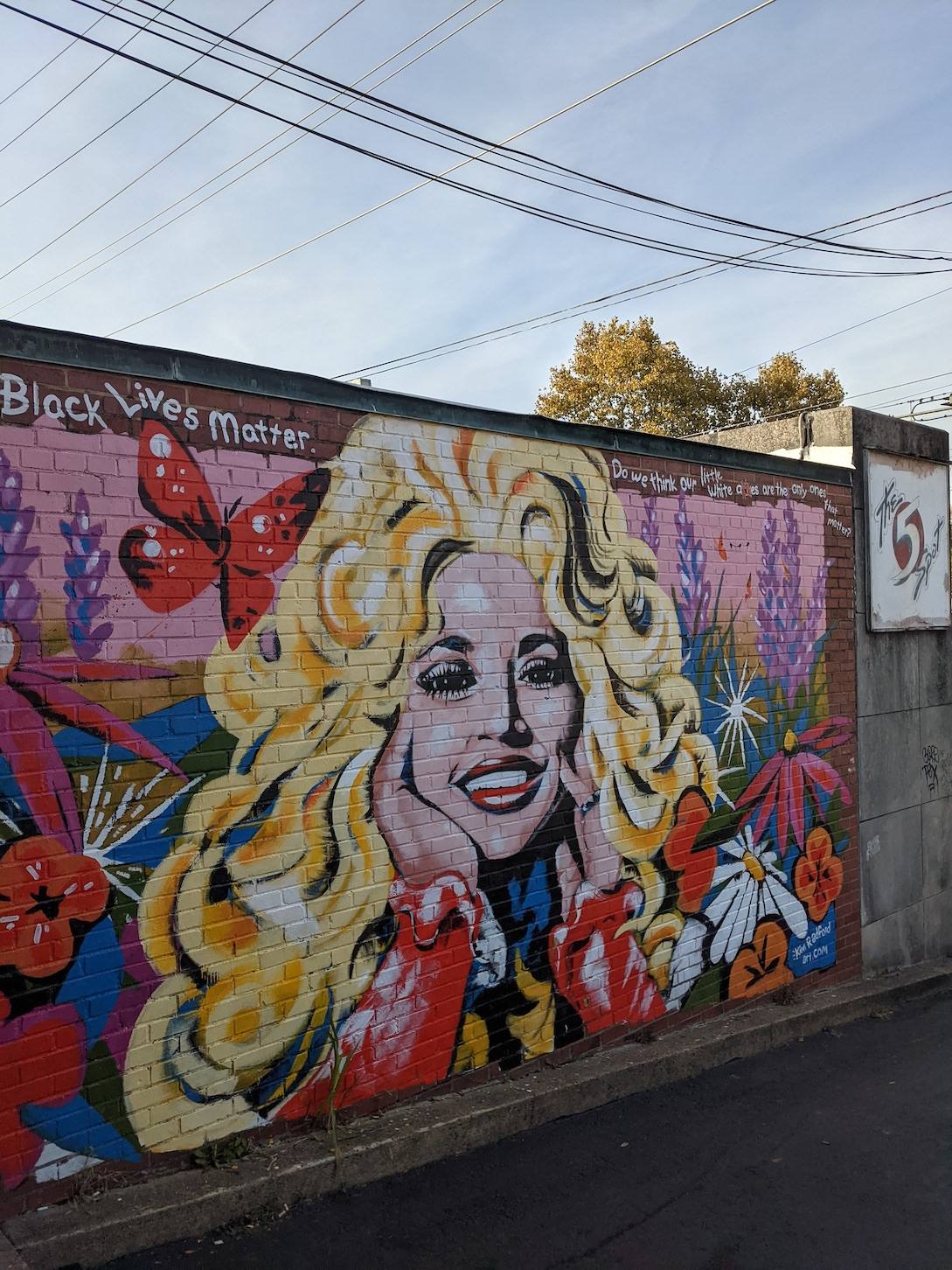 Dolly Parton mural outside The Hip Zipper