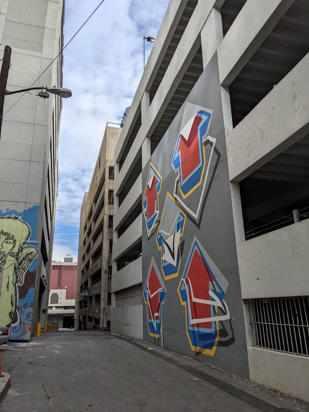 "Arrows" mural alleyway view