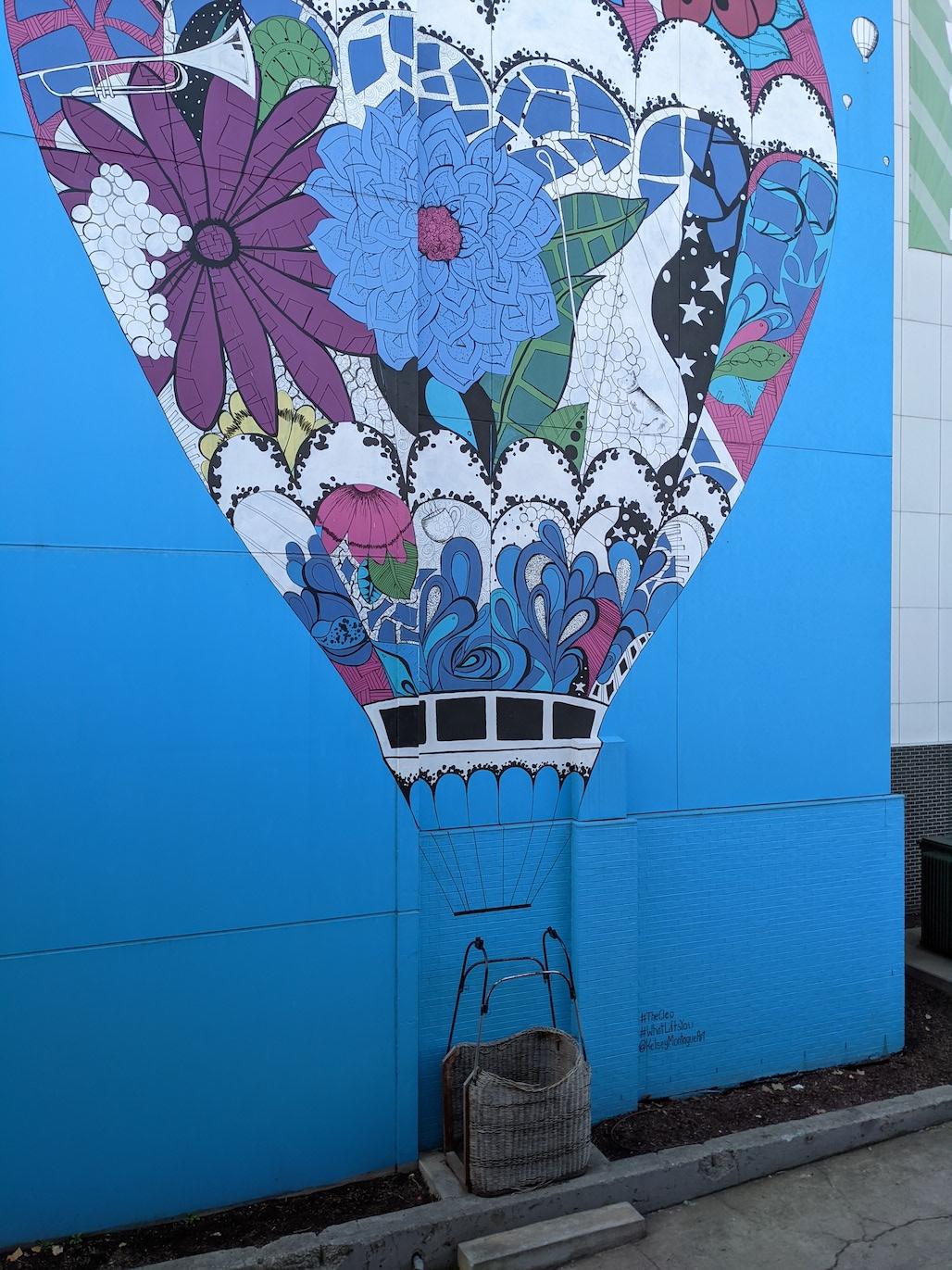 The massive Cleo "What Lifts You" baloon mural