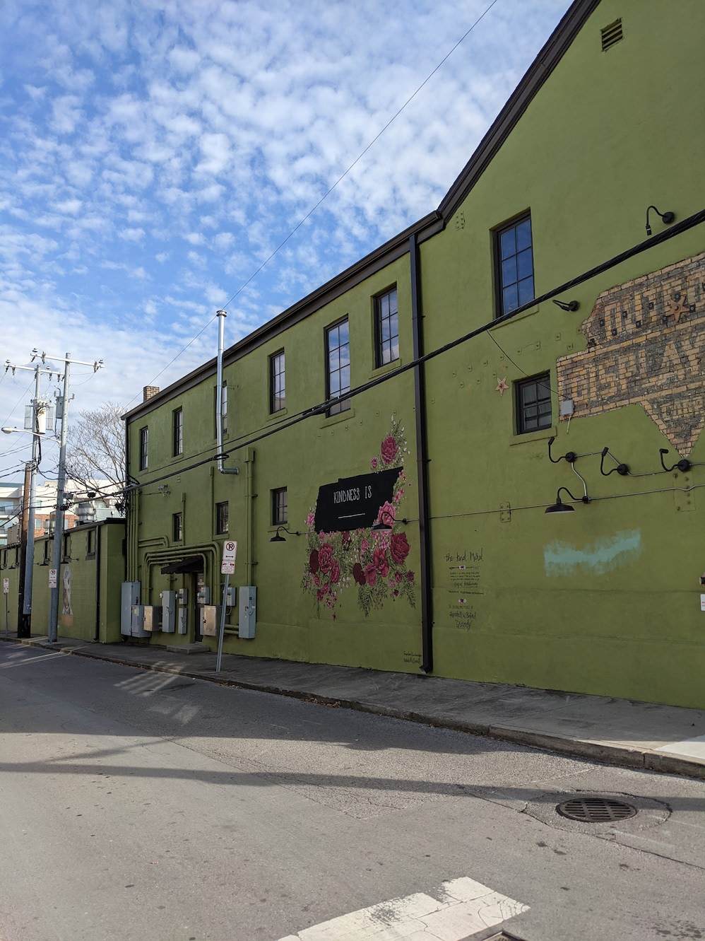 "Kindness Is..." mural across street