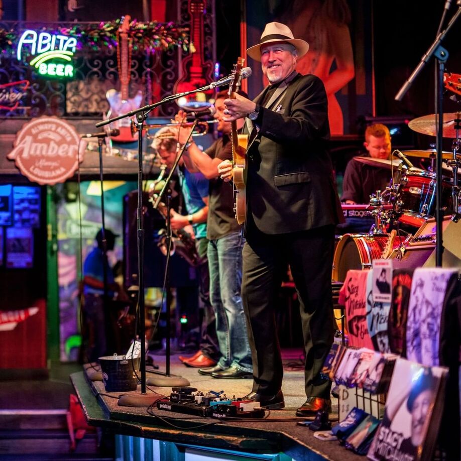 Bourbon Street Blues guitarist in hat