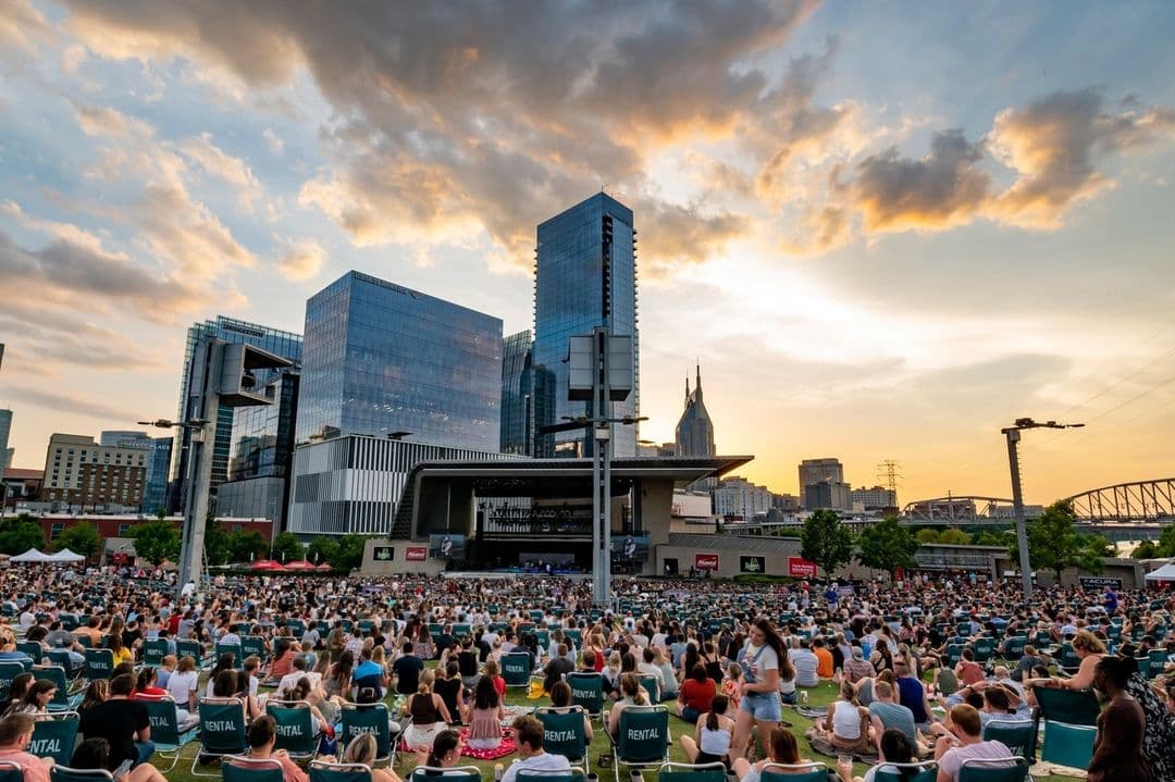 A concert at Ascend Amphitheater with Nashville in the background