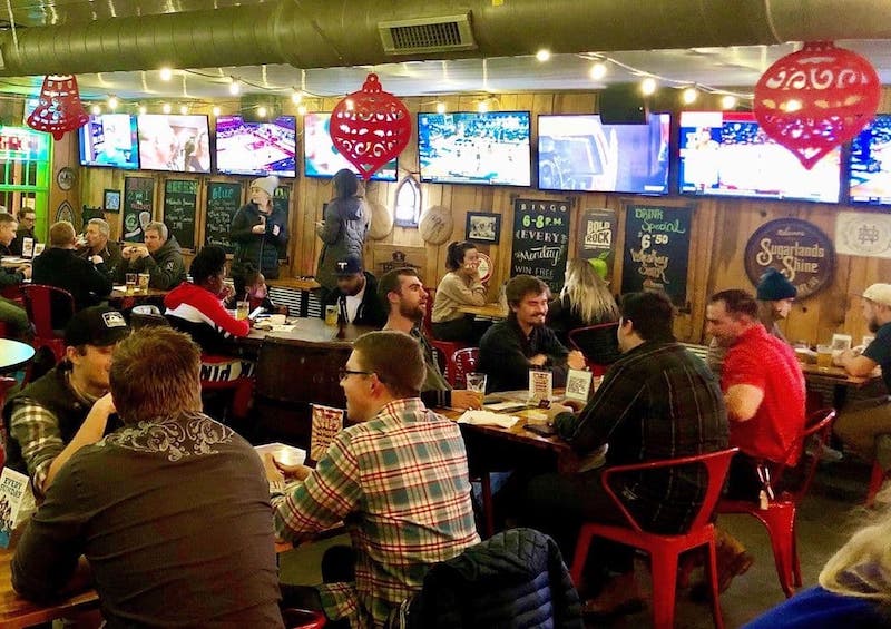 People dining at Smokin Thighs WeHo