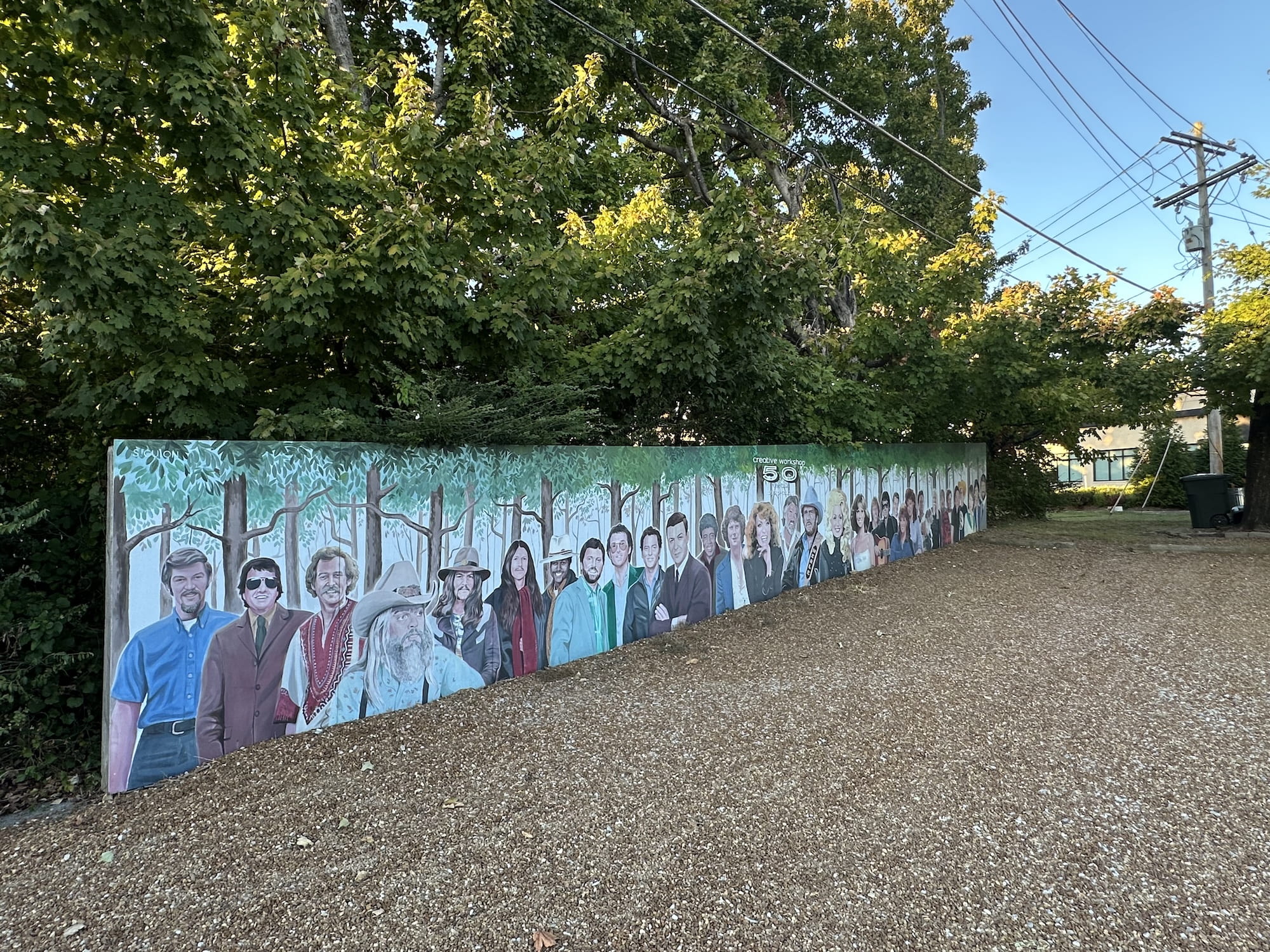 Country stars mural on fence in driveway