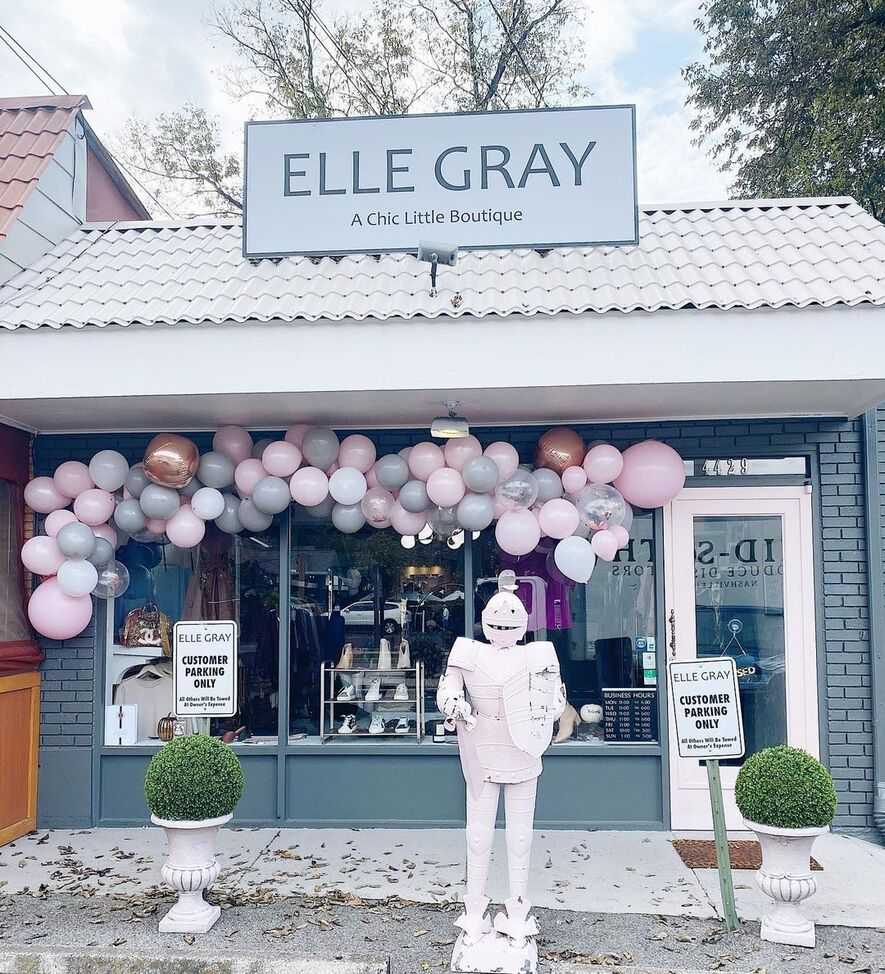 Elle Gray in Sylvan Park's exterior with baloons