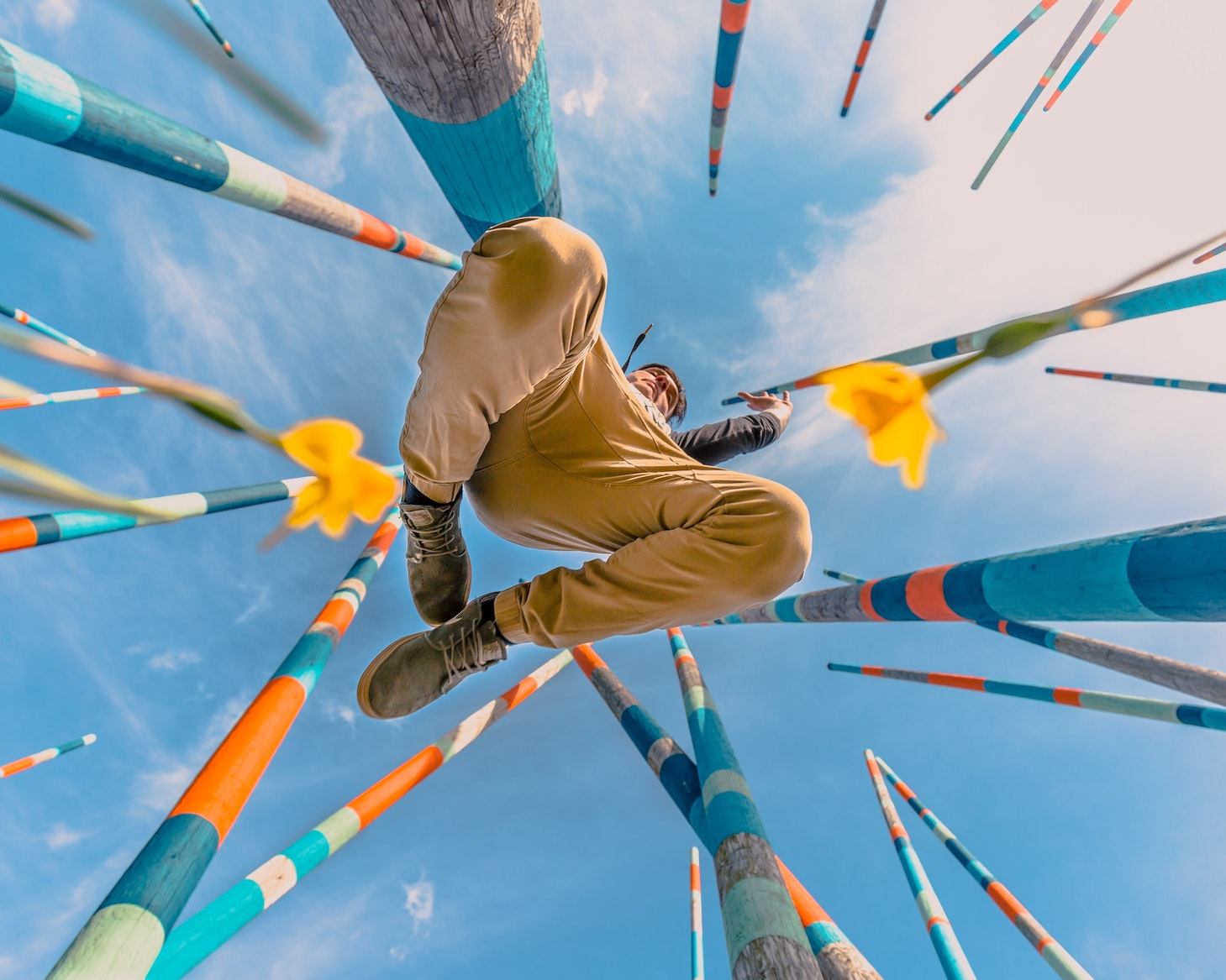 Man jumping at the sticks