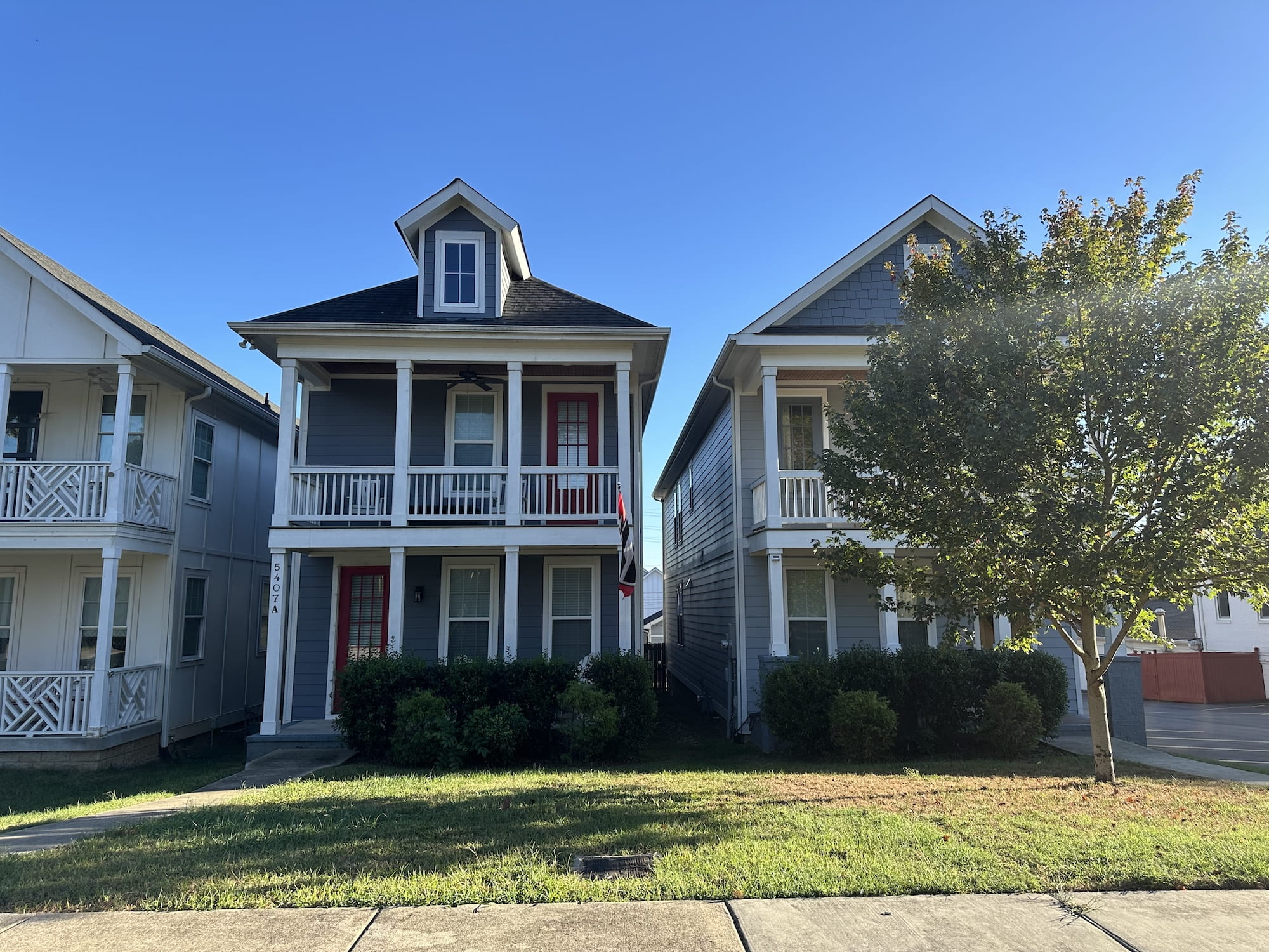 Two houses with a small yard