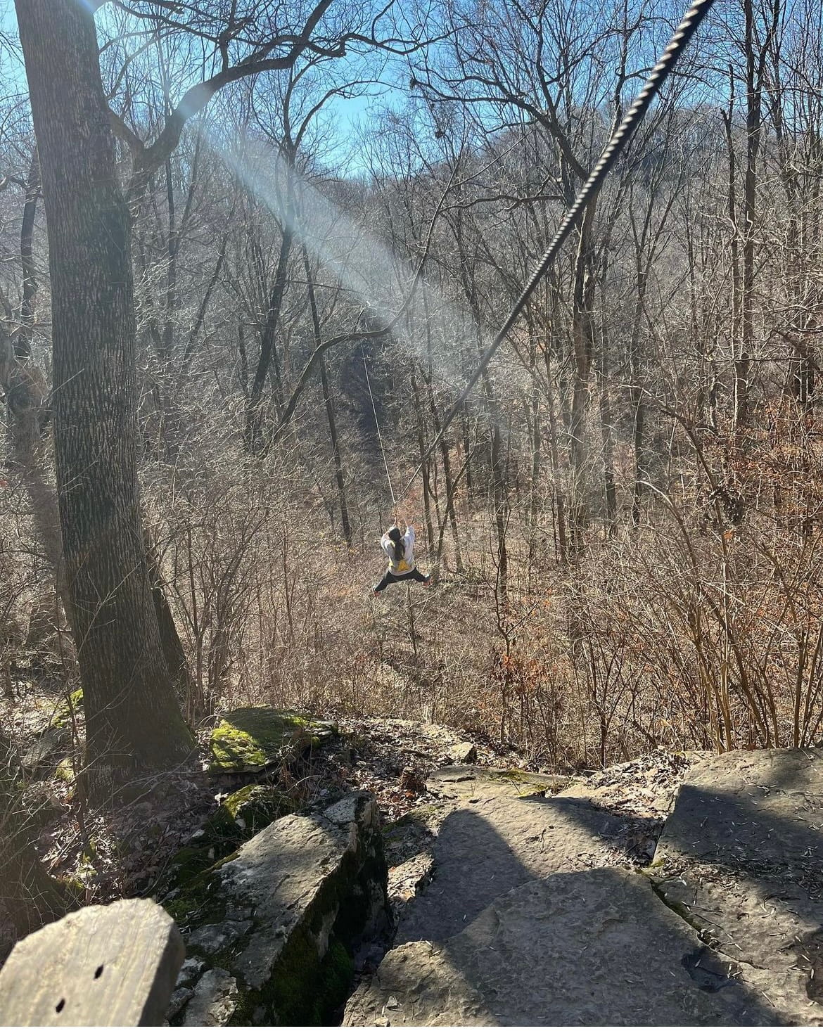 Riding a zipline