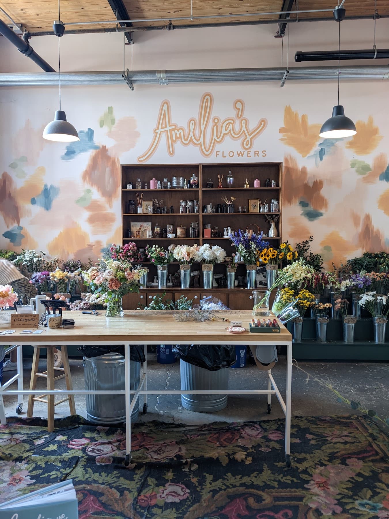 The main table at Amelia's Flowers inside L&L Market