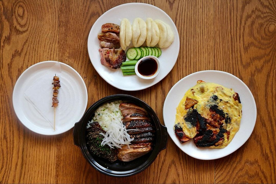 Multiple plates on a wooden table