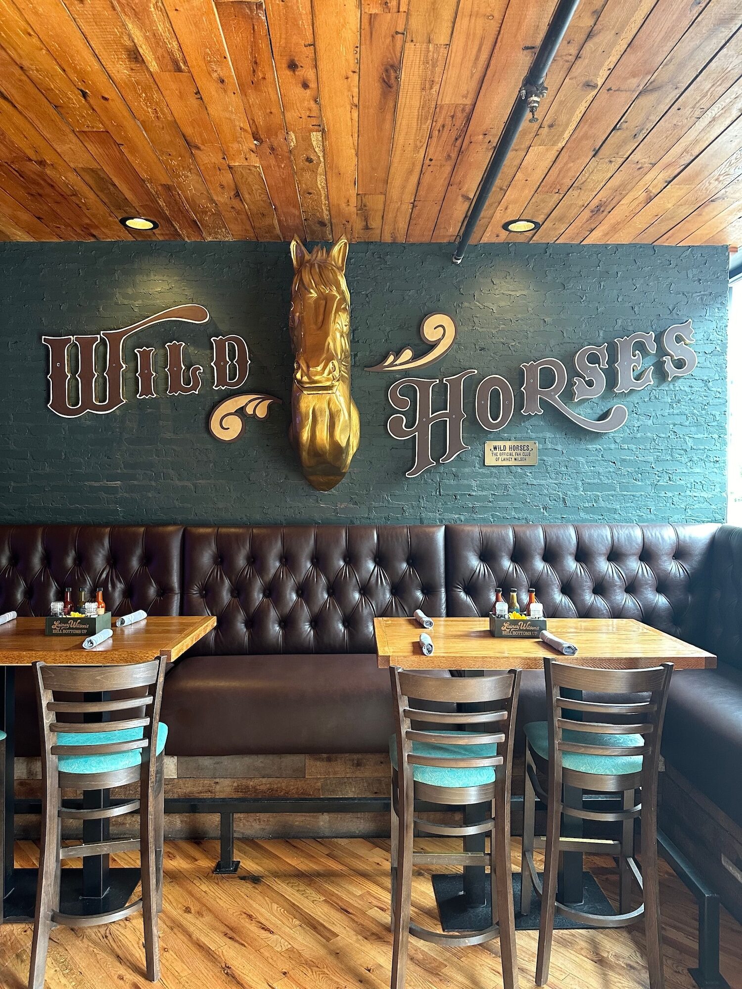 Wild horses artwork on a wall