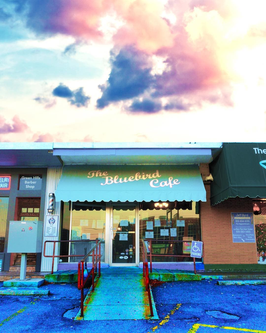 Bluebird Cafe during a vibrant sunset