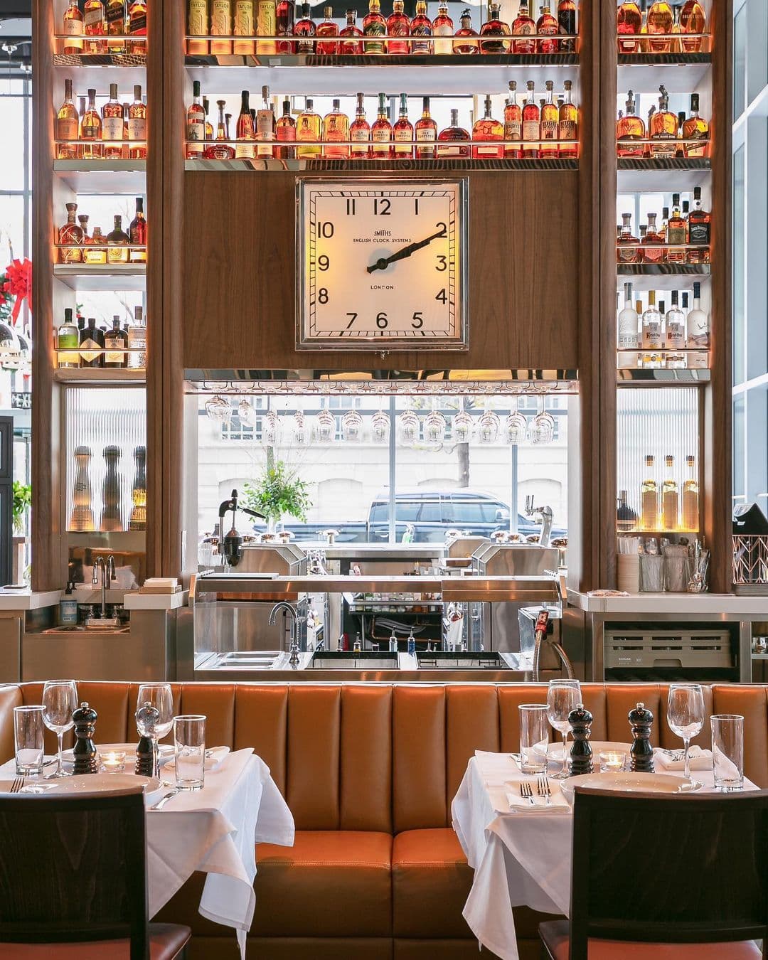 A large clock and bar