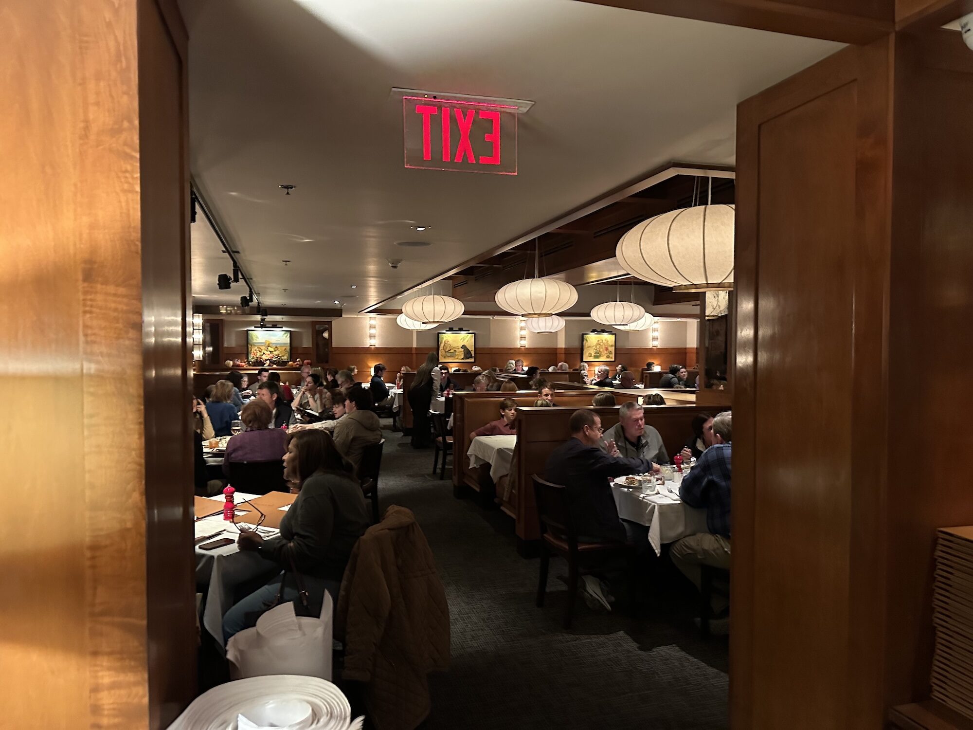 People eating at tables at a restaurant