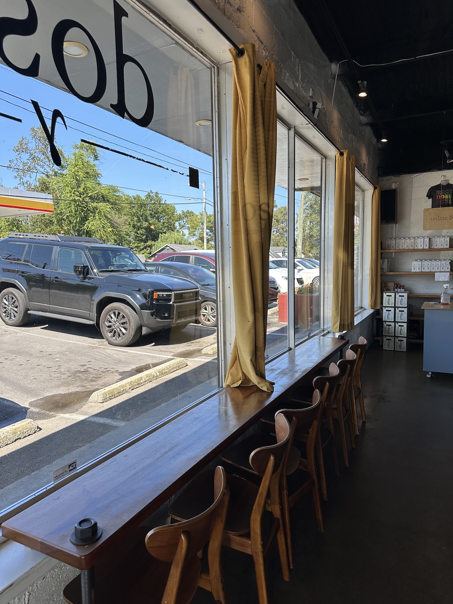 Seats by the window at Dose Coffee