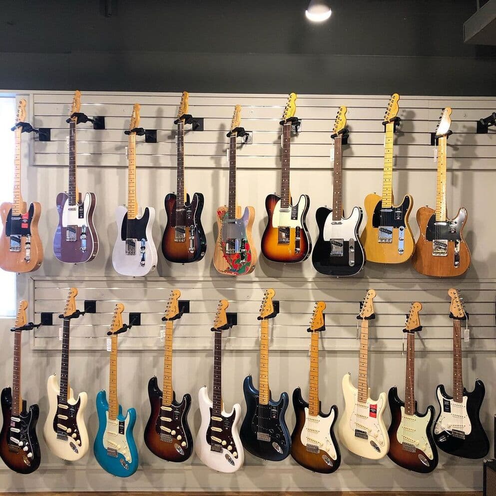 Gruhn Guitar's wall of Fender guitars