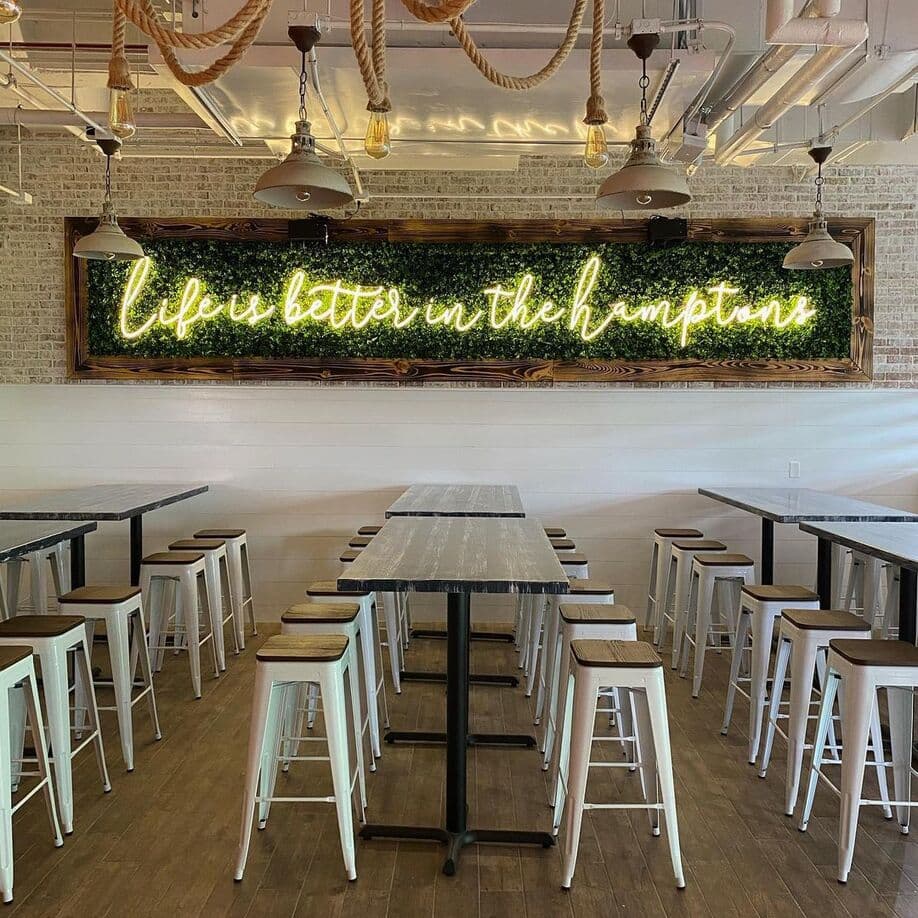 A Hamptons sign at Hampton Social