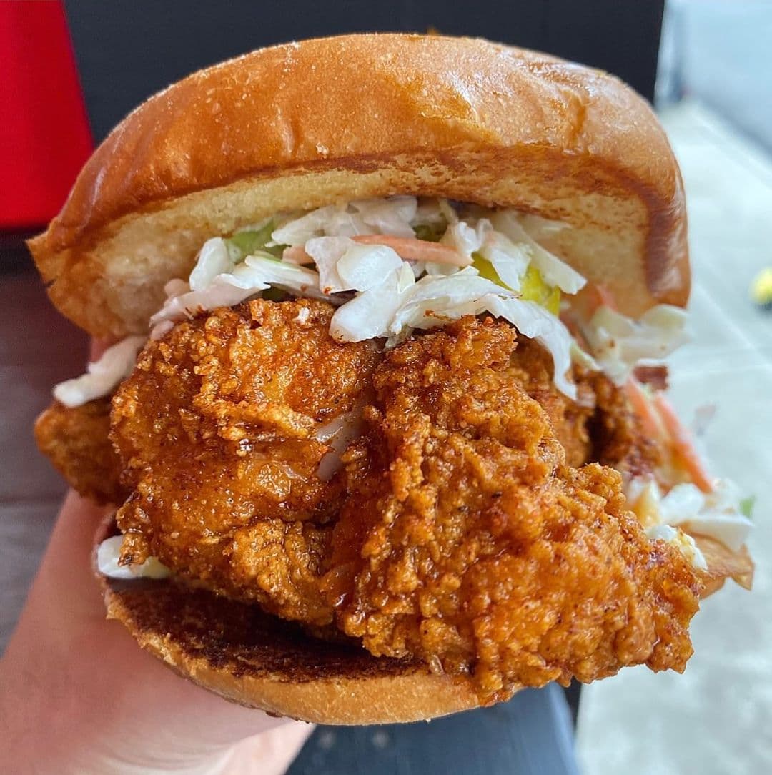 Hattie B's sandwich in hand