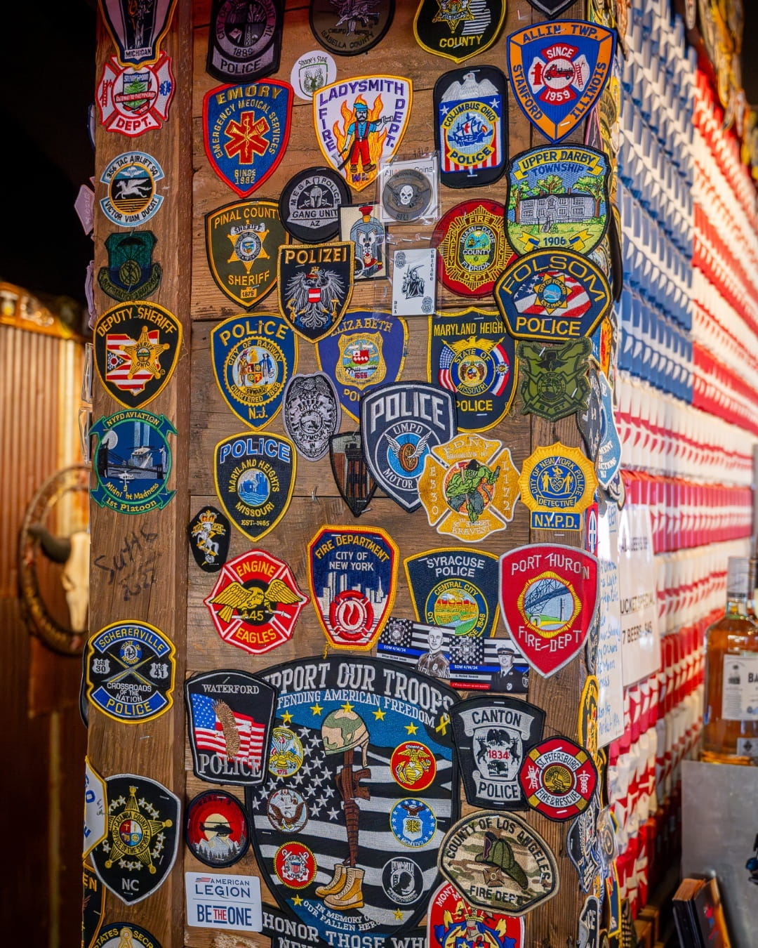 Police badges on a wall