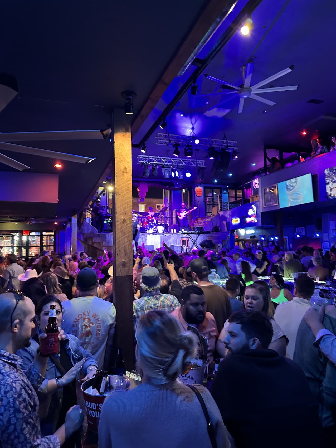 A band plays at Kid Rocks to tons of people