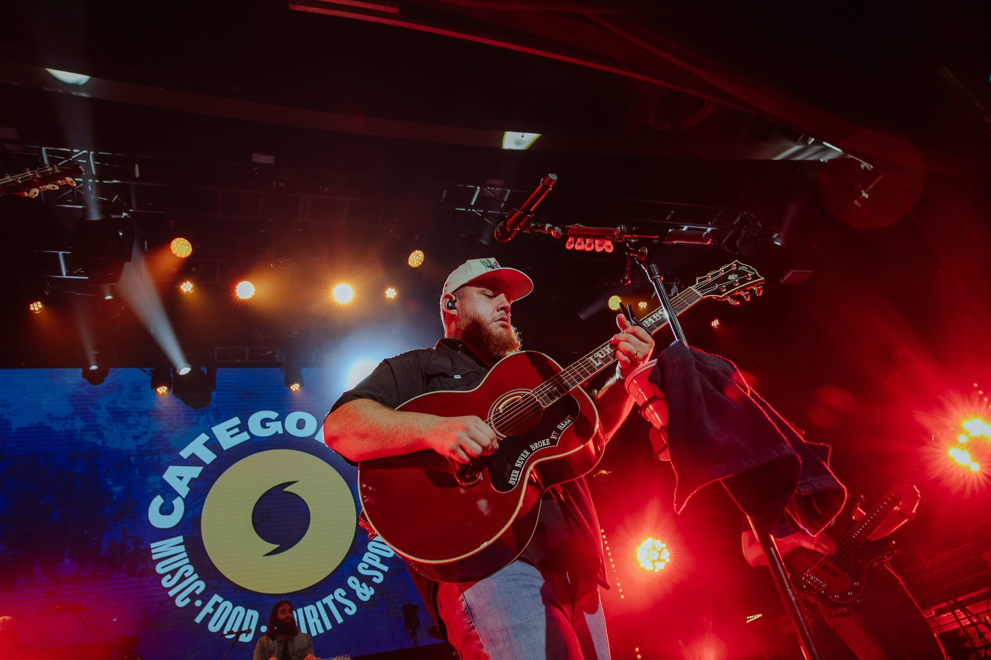 Luke Combs playing guitar