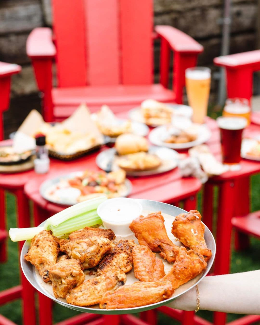 Chicken wings and red chairs