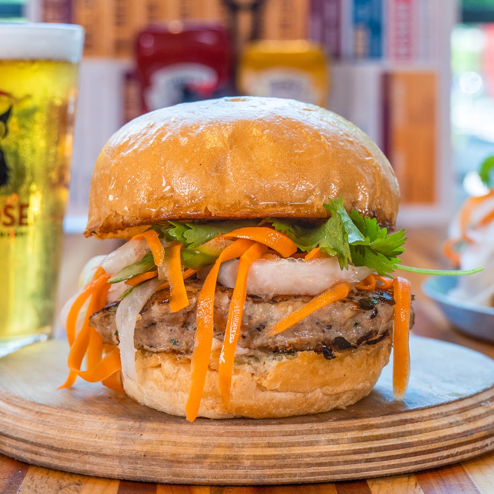 A burger with carrots on it