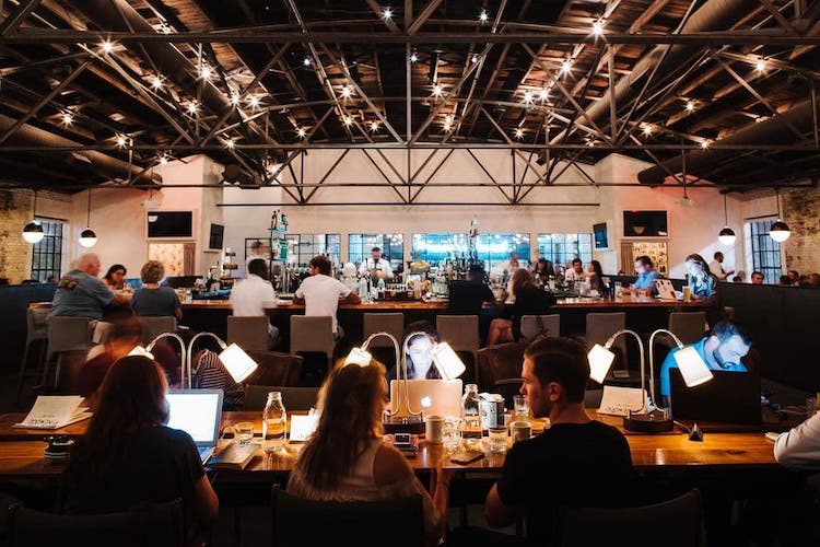 Pinewood Social desk and bar