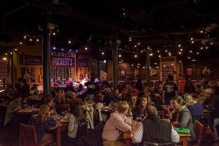 A concert at a crowded restaurant