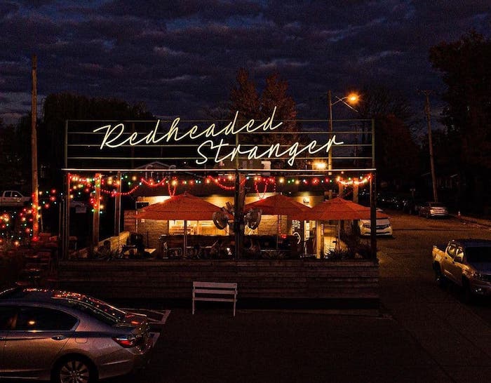 Outside Redheaded Stranger at night