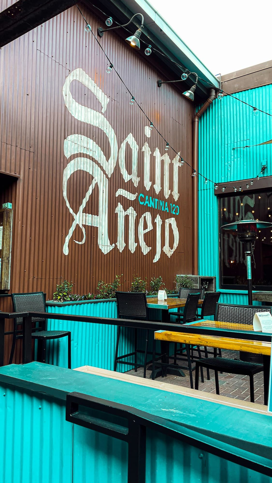 Saint Anejo patio and wall artwork