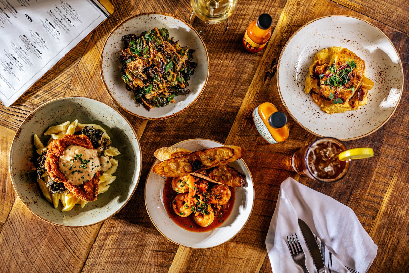 Multiple southern style dishes on a table