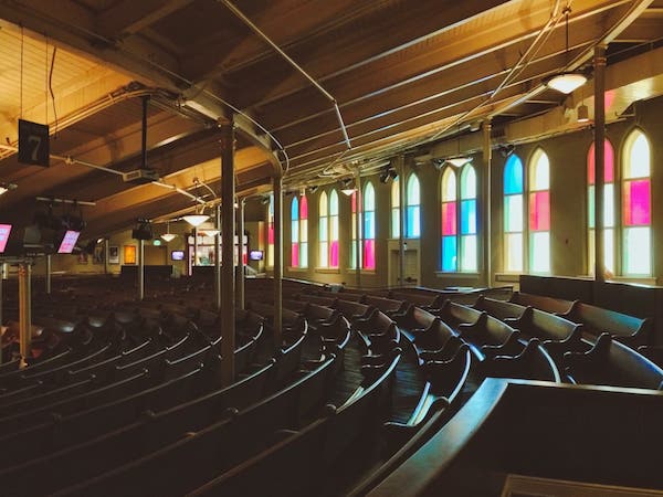 Ryman stained glass windows and pews