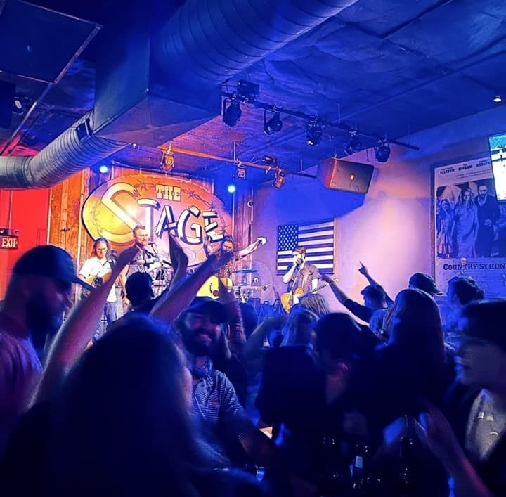 A live band playing at The Stage