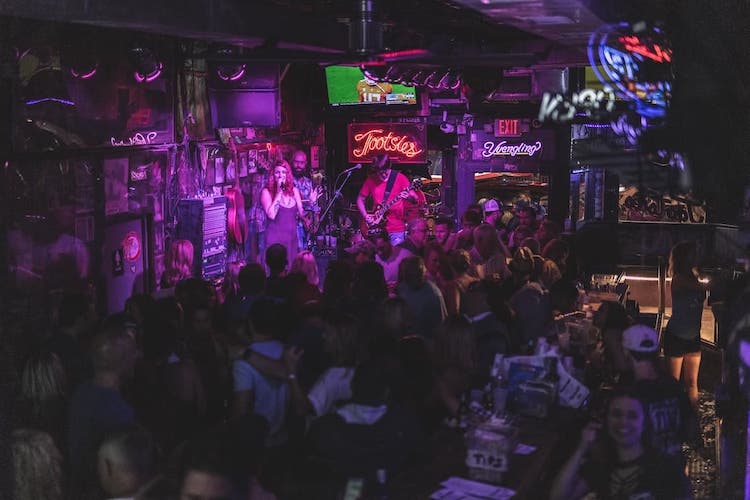 A packed Tootsies with live music